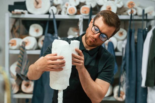 istock Bandages the raw material. Technician working in modern laboratory 1497874601
