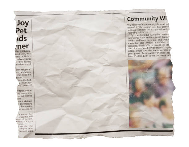 istock Wrinkled newspaper clipping with blank space for your copy 1497877780