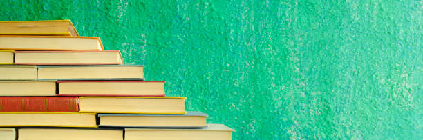istock stack of books forming a staircase,education,ladder of success,knowledge concept,panoramic,large copy space 1497885578