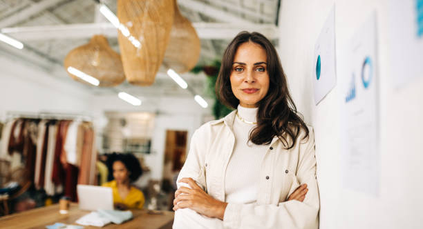 istock Business confidence: Small business owner looking at the camera with crossed arms 1497886799