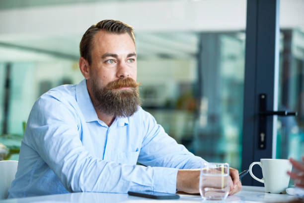 istock Handsome man in a meeting 1497890314