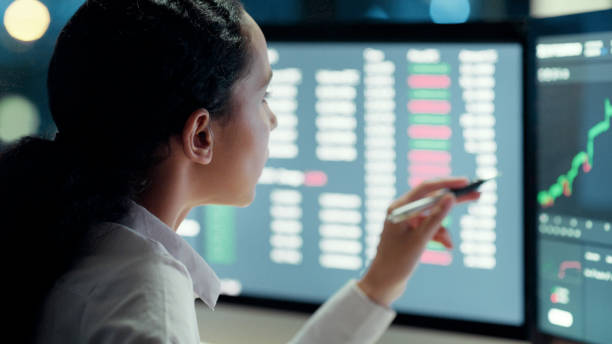 istock Stock market trader, investment manager or portfolio broker analyzing data, statistics and information about finance, share prices and indices. Business woman thinking and working on a computer 1497891451