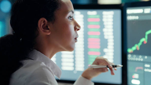 istock Stock market trader, investment manager or portfolio broker analyzing data, statistics and information about finance, share prices and indices. Business woman thinking and working on a computer 1497891492