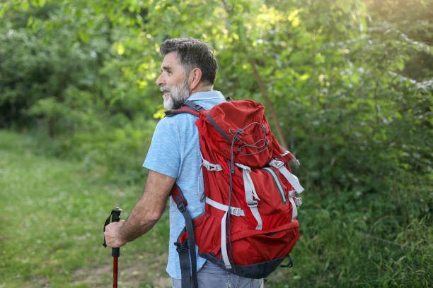 istock Mature man hiking 1497895063