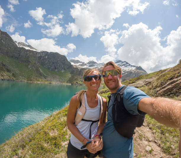 istock Couple take selfie on a summer hike 1497895774