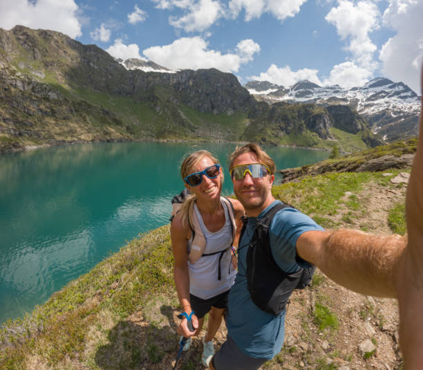 istock Couple take selfie on a summer hike 1497895788