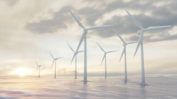 istock Camera pulls back through rotating blades of a wind turbine in an offshore wind farm in the sea against low sun. Green and renewable energy concept. Realistic high quality 3d animation. 1497895943