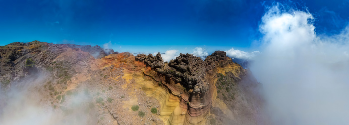 Aerial fly over above the clouds at the beautiful Caldera de Taburiente National Park in La Palma - Canary Islands