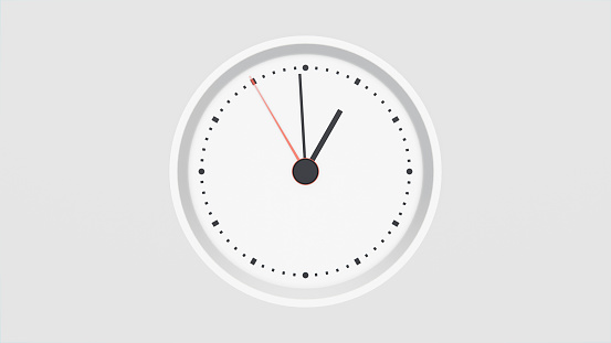 Part of analogue plain wall clock on white wall background. Four o'clock twelve minutes. Close up with copy space, timing, time management, opening hours time, school concept and lunch time