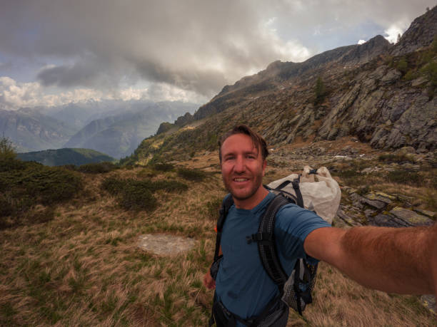 istock Hiker takes cool selfie surrounded by nature 1497897557
