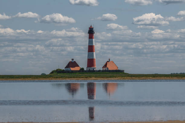 istock St. Peter-Ording, Westenhoefer Lighthouse, North Sea, Schleswig-Holstein, Germany 1497899281