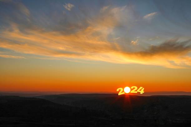 istock Transition from 2023 to new year 2024 concept with text on sun rising sky. Creative Concept. 1497903360