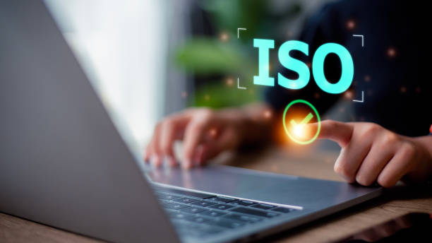 istock Woman presses his finger on check mark with the abbreviation ISO. ISO quality control certification concept. 1497903397