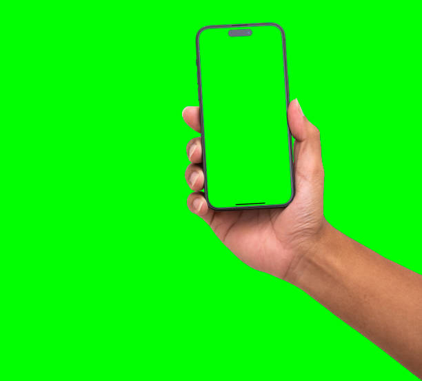 istock Hand holding smart phone Mockup and screen Transparent and Clipping Path isolated for Infographic Business web site design app 1497903443