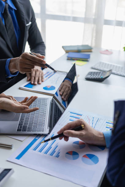 istock Investments, stock market analysis, document auditing, accounting, business structure analysis and information exchange, recruitment, human resources, teamwork strategies. Portrait image 1497909456