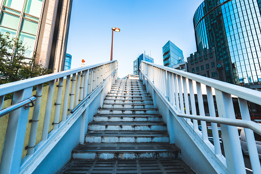 Personal development concept. Future success. first step. Businessman running climbing stair for successful career achievement with help of big leader hand, development growth progress vision future