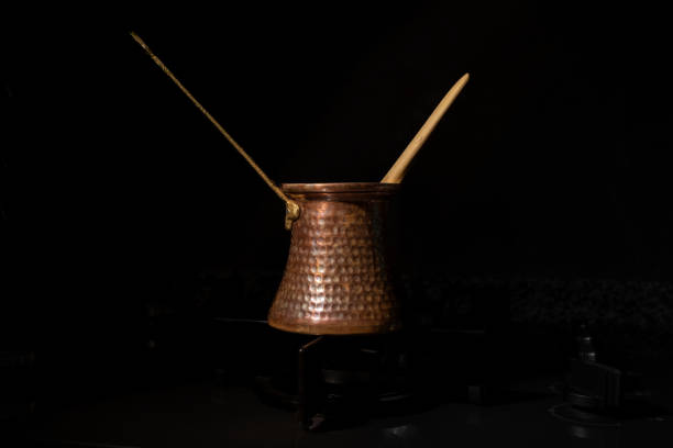 istock Traditional Turkish coffee with sparkling in a traditional coffee pot 1497910535