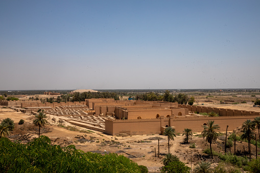 The ruins of Babylon with their lion motifs and large gates and entrances reside in Southern Iraq close to the Euphrates river. Tourists can reserve English speaking tour guides at this historic site which has been part restored by Saddam.