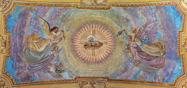 Ivrea - The ceiling fresco of Lamb of God among the angels in the church Chiesa di San Salvatore by G. Silvestro from beginn of 20. cent.