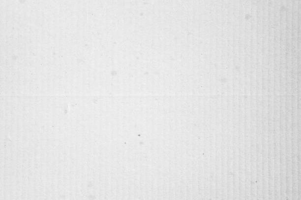 istock Horizontal kraft carton box with lines and stains paper texture 1497913530
