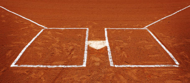 istock Baseball Diamond Base or Plate White Against Dark Dirt for Competition and Playing Game 1497915233