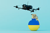 The war in Ukraine. Flying quadcopter next to a grenade in the colors of the flag of Ukraine. 3D render