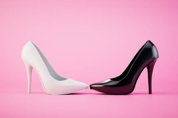 istock Women's confrontation. White and black high-heeled shoes on a pastel background. 3D render 1497927381