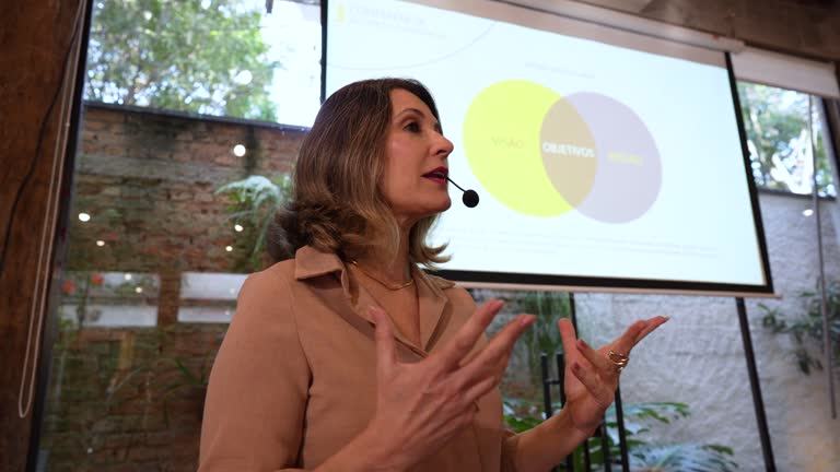 Portrait of a woman speaking at the conference