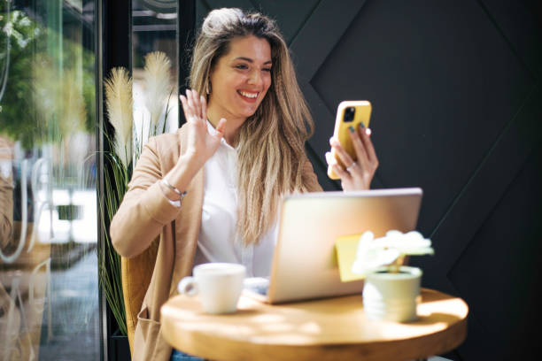istock Beautiful young woman sitting in caffee. 1497928165