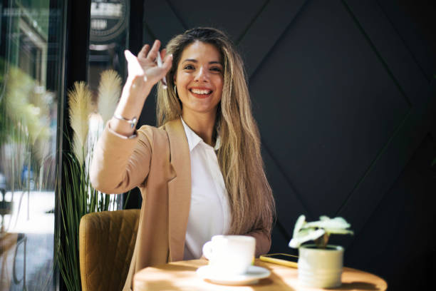 istock Beautiful young woman sitting in caffee. 1497928347