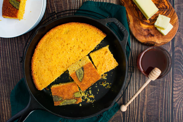 istock Sage Cornbread Cut Into Pieces in a Cast-Iron Skillet 1497930953