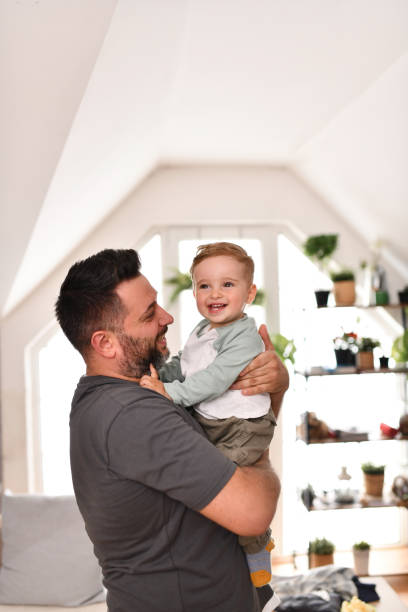 istock Play Time And Bonding By Father And Baby Son 1497938292
