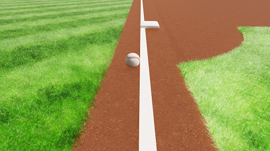 A baseball batted ball rolls on the white line of the third base line and is in an unstable state where it is not clear whether it is foul or fair.