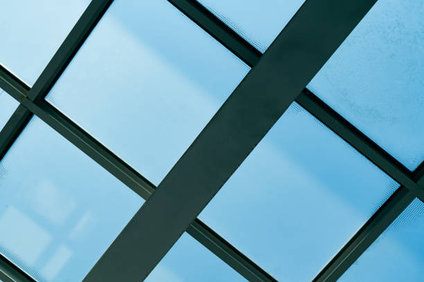 istock Sky and clouds seen through glass roof 1497939663
