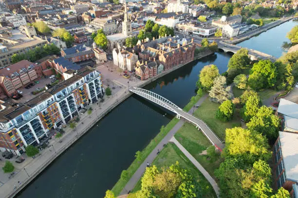 Aerial Footage of Historical Bedford City of England During Sunny Day of May 27th, 2023. The Footage Captured with Drone's Camera from Medium High Altitude over the City and River Ouse and Station.