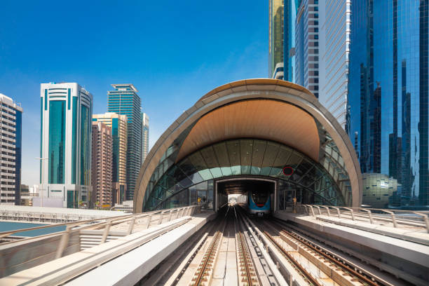 istock Modern skyscrapers along the metro line in Dubai, UAE 1497946238