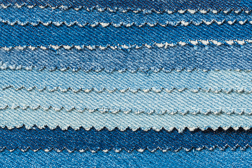 Set of Denim sample pieces, fabric samples for selection and clothes manufacture. Textile background