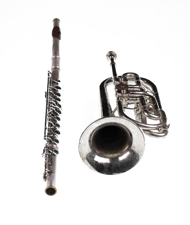 Side angle view of brass trombone with black and white variations 3d rendering