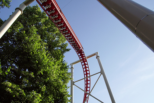 Low angle view of a a roller coaster against the sky