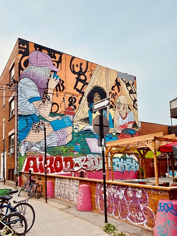 Montreal, Canada – June 10, 2023: A vibrant wall mural in the Mural Festival D'Art Urbain of 2023 in Montreal