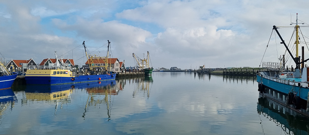 The harbour and quayside in Saint-Jean-de-Luz, Pays Basque, South West France with fishing boats.