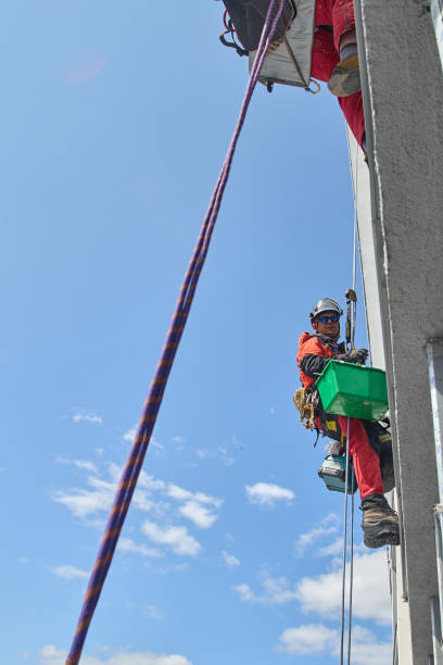 istock Rope access window cleaner. Skyscraper Washing 1497961558