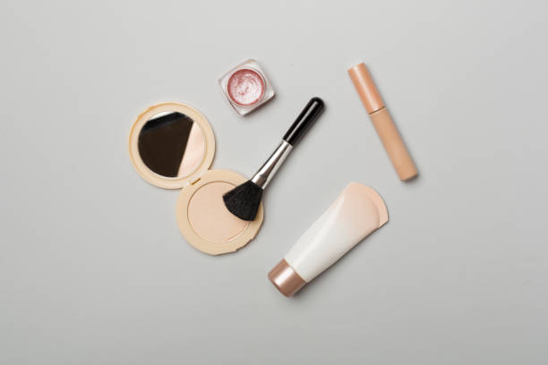 istock Makeup products for skin tone on color background, top view 1497962537
