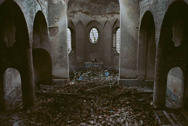 istock Bricks and ruins right by the altar in the ancient abandoned church. 1497967444