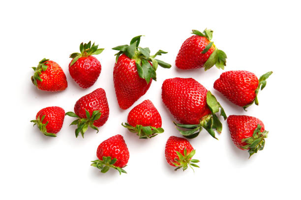 istock Ripe strawberries isolated on white background top view. 1497974096