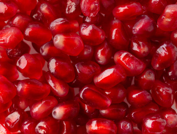 istock Fresh pomegranate seeds for food background 1497974107