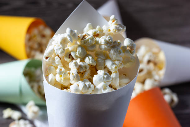 istock Close-up of a cone full of popcorn. 1497975169