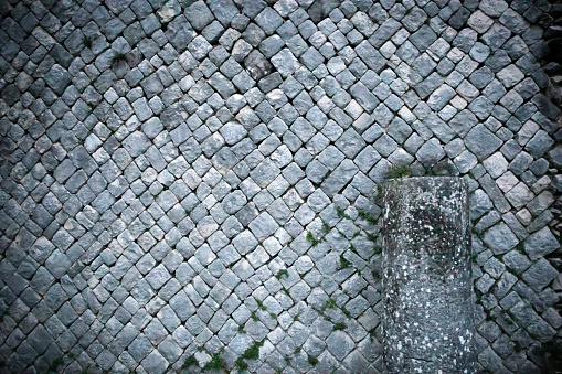 Ancient roman wall, (1st century A.D,), made of diamond shaped stones. Photo taken at Sepinum, in the Molise region, in Italy