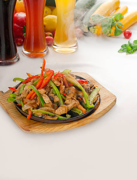 istock original fajita sizzling hot  on iron plate 149797822
