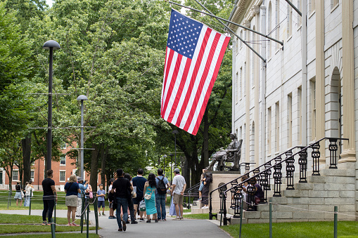 Boston, Massachusetts, USA - May 13, 2021: Baker Library on the Harvard Business School (HBS) campus. Dedicated in 1927 and named for George F. Baker, the benefactor who funded HBS's original campus. It is the largest business library in the world.